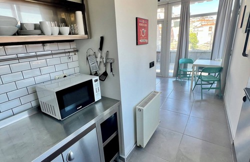 Cihangir Apartment | Charming terrace apartment in historic Istanbul with dreamy Bosphorus views.