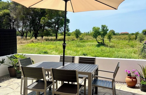 Ag. Georgios Villa | Charming Villa with Garden, 10-Min Walk to St. George Beach, Close to Amenities
