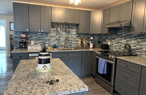 Niagara County House | Cheerful Lake Ontario House in Wilson New York.