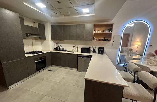 Jumeirah Village Circle Apartment | Chic 1-bedroom apartment in fabulous Jumeriah Village Circle with AC, WiFi