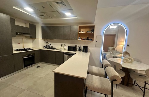 Jumeirah Village Circle Apartment | Chic 1-bedroom apartment in fabulous Jumeriah Village Circle with AC, WiFi