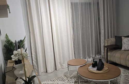 Greater Johannesburg Metropolitan Area Apartment | Chic 1-bedroom apartment in welcoming Midrand with fitness room, WiFi