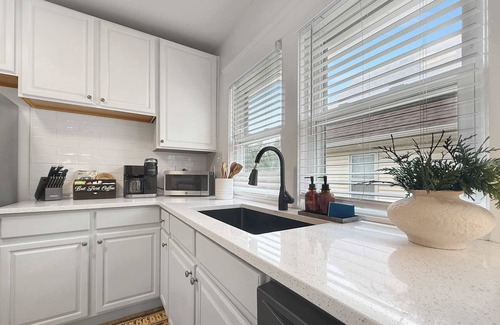 Edgewater Apartment | Chic Lakeside Retreat , Steps from the Beach!