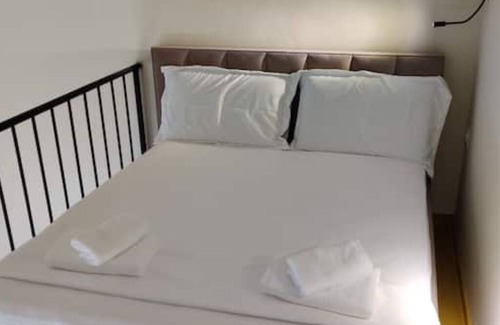 Qender Hotel | Chic Warehouse Loft in Central Saranda – Walk to Port & Promenade!