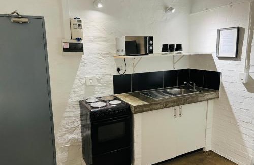 Downtown Johannesburg Apartment | City Living Apartment 119 - Private Balcony, Washing Machine & Fast WiFi