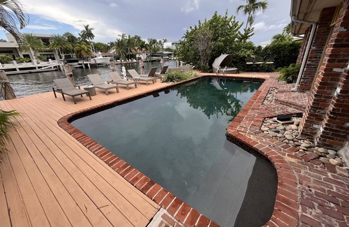 Lauderdale Harbours House | Classic 4/4 Bath Beach Home, 8 beds, Heated Pool, Ocean Access Canal, Dock