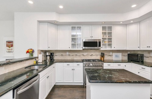 Westhampton House | Classic-style Hamptons home, heated freshwater pool, fire pit, extensive.