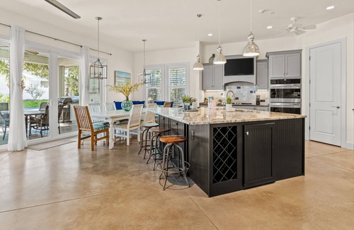 Emerald Waters Village House | Coastal charmer with huge screened patio, pool access, & W/D - minutes to beach