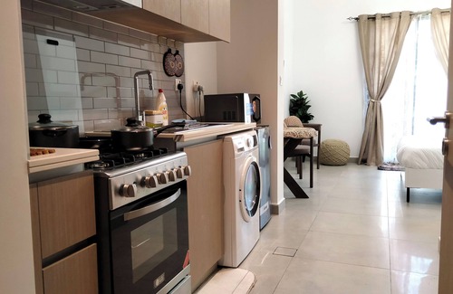 Al Khan Apartment | Coastal Elegance: Studio, Pool & Beach Proximity