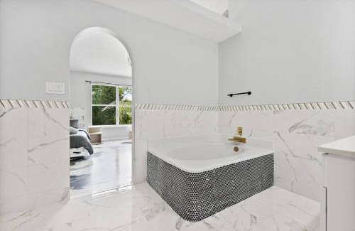 Palm Coast House | Coastal Retreat - Roomy, Relaxing, Heated Pool