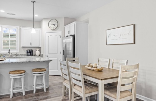 Morehead City House | Coastal townhome with outdoor living, central AC, washer/dryer, & pool access