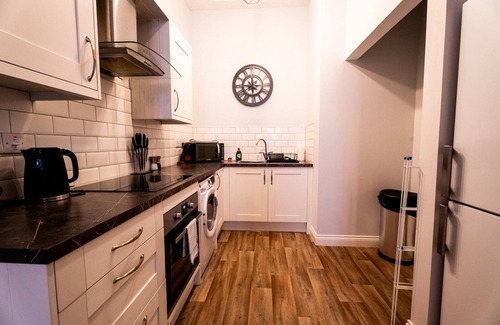 Castle Apartment | Cohost Partners Chapel Retreat | King Bed | Swansea