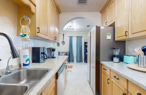 East Daytona House | Colorful charmer with ocean views, deck, & dog-friendly yard - snowbird-friendly