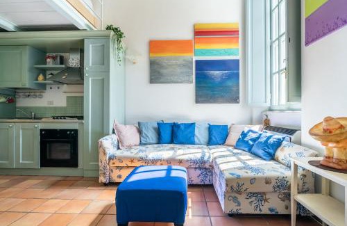 Calambrone Apartment | Colors House On The Beach by Pleiades Home
