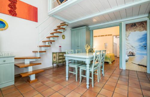 Calambrone Apartment | Colors House On The Beach by Pleiades Home