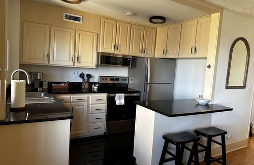 Peachtree Center Condo | Come enjoy a cozy, spacious high-rise condo with breathtaking sunset views.