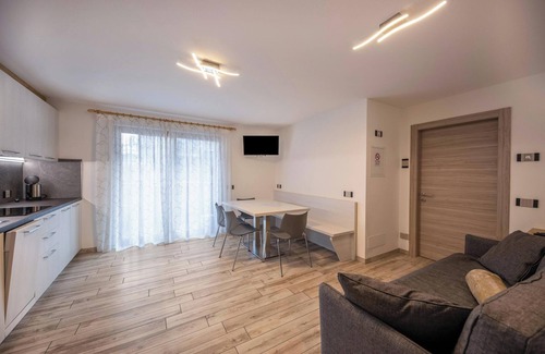Predazzo Apartment | Comfortable Apartment “Vacanze Arcobaleno - Arancione” with Mountain View