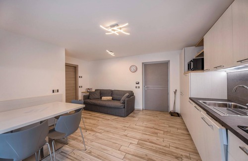 Predazzo Apartment | Comfortable Apartment “Vacanze Arcobaleno - Arancione” with Mountain View