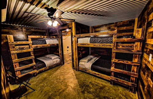 Belle Prairie City Cabin | Comfortable lodging with full bar. Kids stay free!