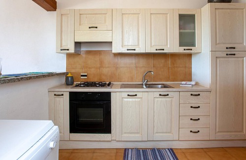 Cala Liberotto Villa | Comfortable Vacation Home “41 Mezza Villa Marina” on the Beach with Sea View & Terrace; Parking Available