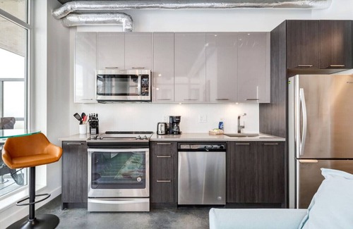 East Village Apartment | Comfy 1BR Calgary Escape w/Balcony, Sleeps 4!