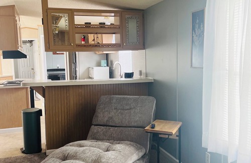 Moorefield House | Comfy Mobile Home located minutes from restaurants and venues.
