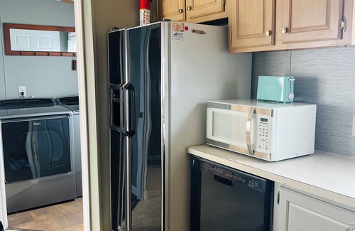 Moorefield House | Comfy Mobile Home located minutes from restaurants and venues.