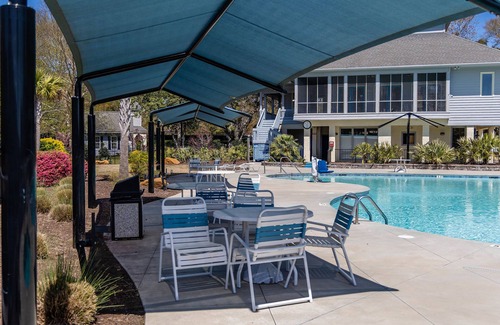 Sunset Beach Condo | Completely Remodeled Luxury Sea Trail Condo on Golf Course. Close to Beach!