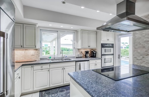 Singer Island House | Contemporary Canal-Front Home with Private Pool & Spa, Free WiFi & Private W/D