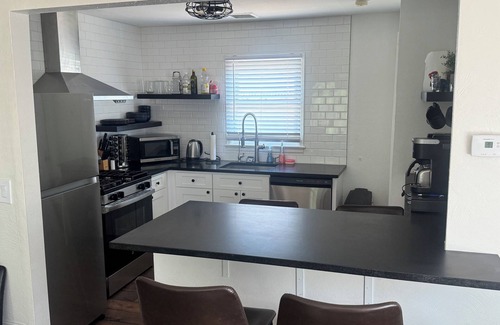 Greeley House | Conveniently located home with large fenced yard