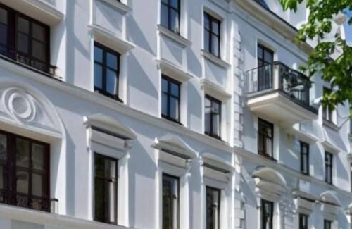 Wesoła Zachod Apartment | Copernicus Studio: Tranquil Balcony, Modern Comfort & Historic Krakow