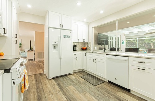 Coquina Sands House | Coquina Sands - Newly renovated - outdoor entertaining oasis w/TV & heated pool - 2 Blocks to Beach!