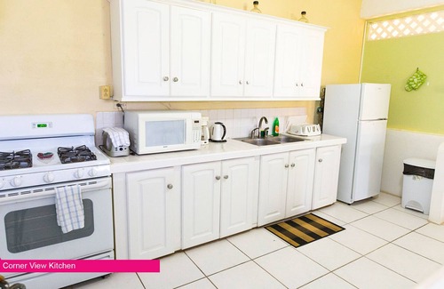 Black Rock Apartment | Corner View, with private sea-view terrace & full kitchen