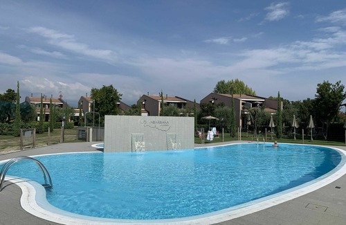Moniga del Garda Apartment | Cosy apartment for 2 guests with WIFI, pool, A/C, TV, balcony and pets allowed