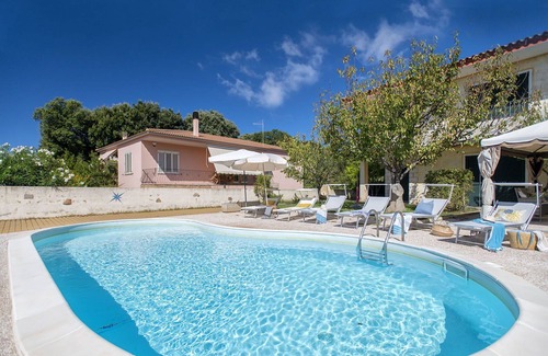 Trinita d'Agultu Apartment | Cosy apartment for 6 guests with pool, WIFI, A/C, TV, patio and parking