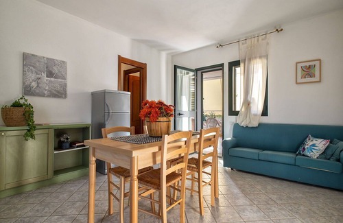 Trinita d'Agultu Apartment | Cosy apartment for 6 guests with pool, A/C, WIFI, TV, patio and parking
