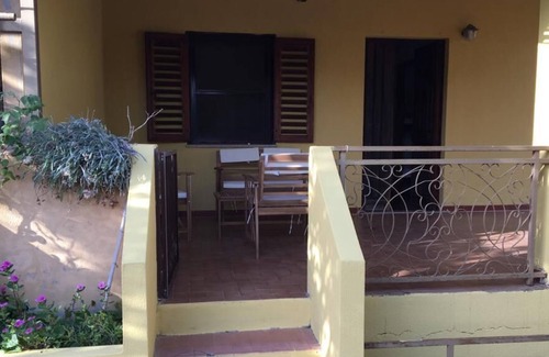 Torre di Bari Apartment | Cosy Apartment “Casa Sa Marina” Close to Beach with Terrace & Garden; Parking Available, Pets Allowed