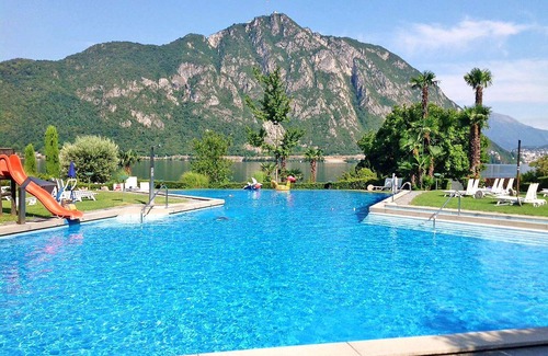 Bissone Apartment | Cosy apartment for 4 guests with pool, A/C, WIFI, TV, balcony and panoramic view