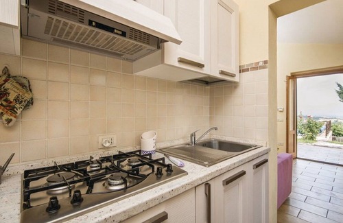 Fornole Apartment | Cosy apartment for 4 people with A/C, pool, WIFI, TV and veranda