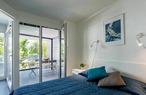Balatonszemes Apartment | Cosy apartment for 6 guests with A/C, WIFI, pool, TV, terrace, pets allowed and parking