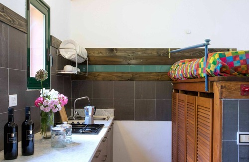 Guardistallo House | Cosy apartment in villa for 5 guests with pool, terrace and pets allowed