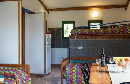 Guardistallo House | Cosy apartment in villa for 5 guests with pool, terrace and pets allowed
