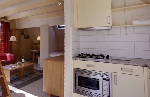 Municipality of Dalfsen House | Cosy apartment in villa for 4 guests with WIFI, pool, TV and terrace