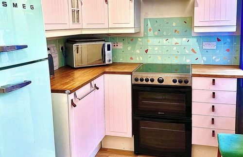 Cairnbaan Cottage | Cosy Pet-Friendly Family Cottage Beside Crinan Canal Enclosed Garden Wood Burner