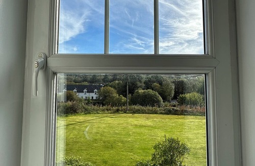 Cairnbaan Cottage | Cosy Pet-Friendly Family Cottage Beside Crinan Canal Enclosed Garden Wood Burner