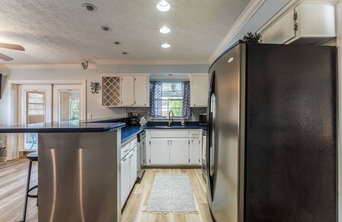 Jacksonville Beach House | Cottage Home with Heated Pool and Screened in Porch.