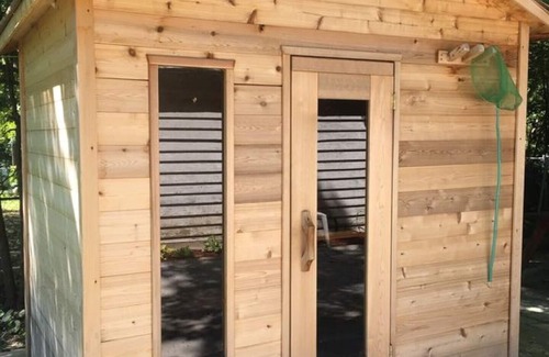 Alcona Cottage | Cottage with hot tub and sauna