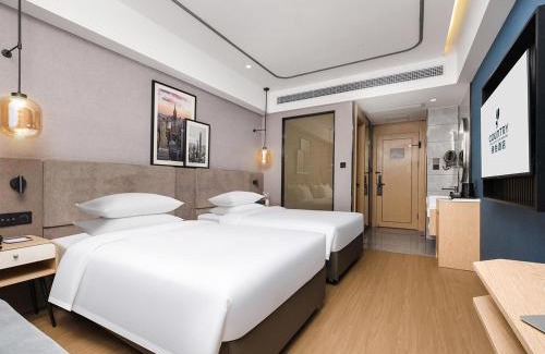 Shajing Hotel | Country Inn & Suites by Radisson Shenzhen International Convention and Exhibition Center