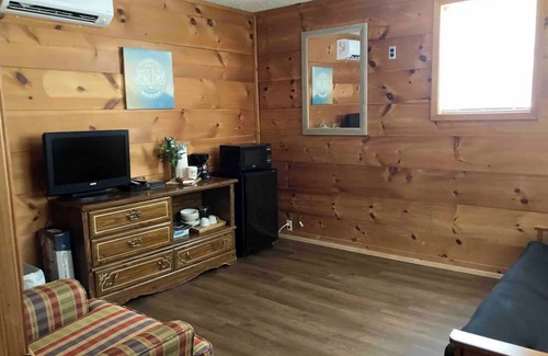 Fifty-Six Cabin | Cozy and centrally located in the middle of all the best of nature’s offerings!