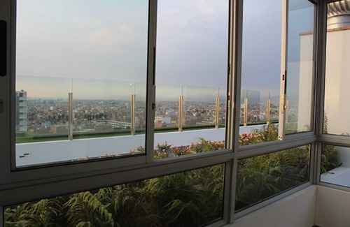 San Miguel House | Cozy apartment Near2the Airport SEAVIEW ROOFTOP